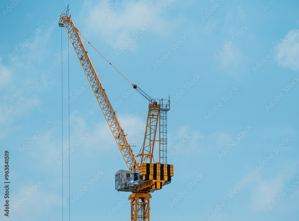 Building under construction, cranes and high-rise building Building under construction, cranes and high-rise building