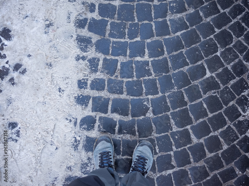 snowy old pavement in lviv old city photo