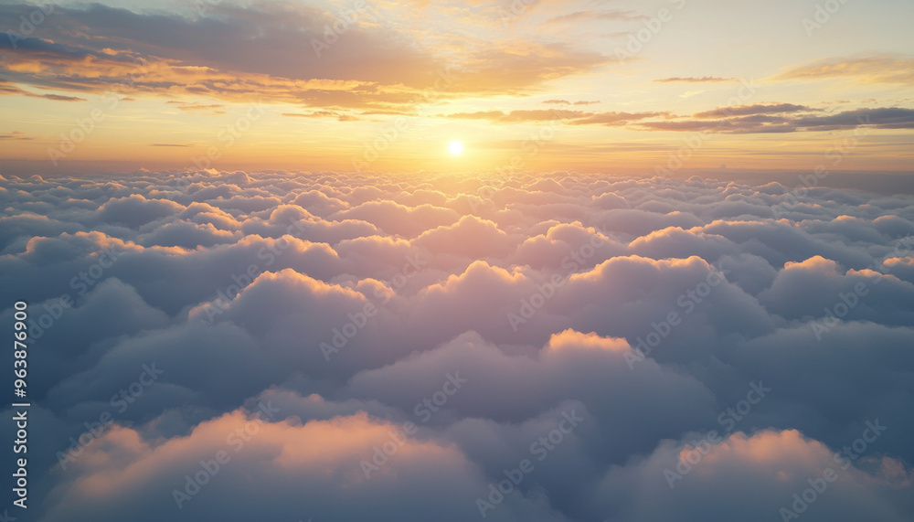 A serene sunset view above fluffy clouds, capturing the beauty of nature and tranquility in the sky.