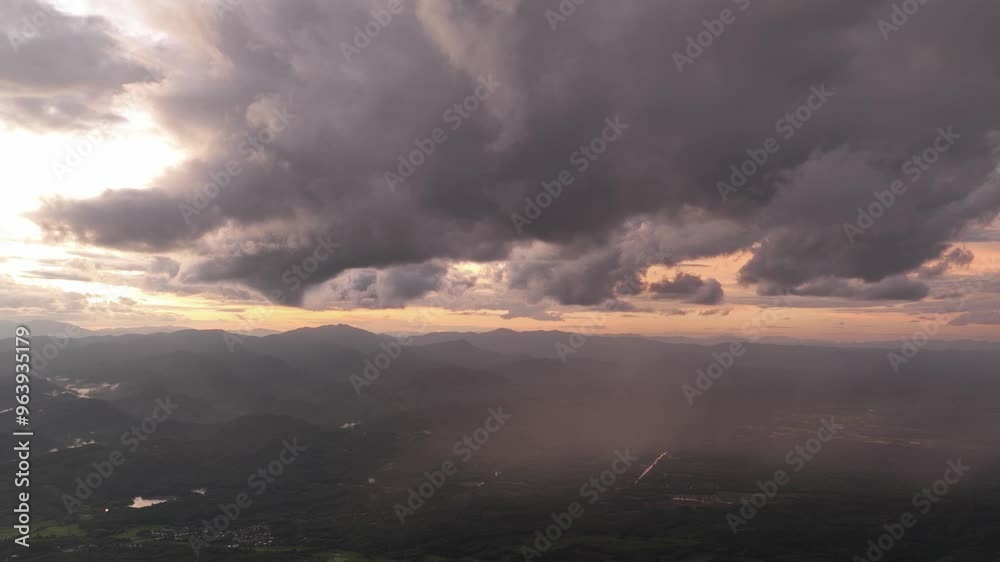 Hyperlapse time-lapse of Rain ,over the mountains with rainbow , fog and cloud mountain valley landscape of Aerial top view forest tree, Rainforest ecosystem and healthy environment concept Hyperlapse time-lapse of Rain ,over the mountains with rainbow , fog and cloud mountain valley landscape of Aerial top view forest tree, Rainforest ecosystem and healthy environment concept