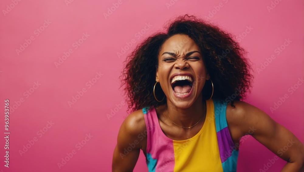 A African American woman with curly hair is laughing and smiling A African American woman with curly hair is laughing and smiling
