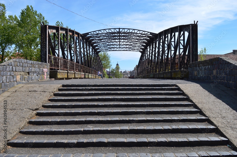 steps on a large metal bridge steps on a large metal bridge
