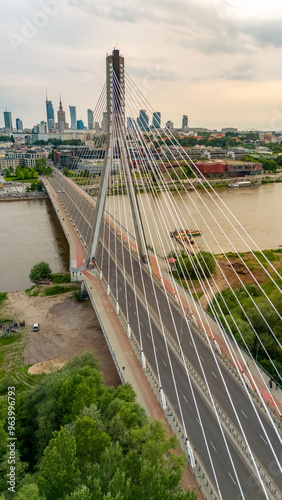 panoramic aerial view of Warsaw city at sunset in summer over the river