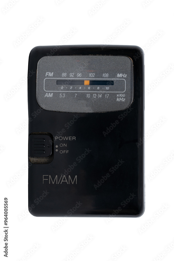 Fototapeta premium Old small FM AM radio black isolated on white background. Vintage.