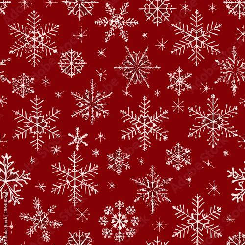 Seamless winter pattern with white snowflakes on a festive red background

