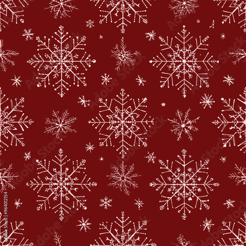 Seamless winter pattern with white snowflakes on a festive red background

