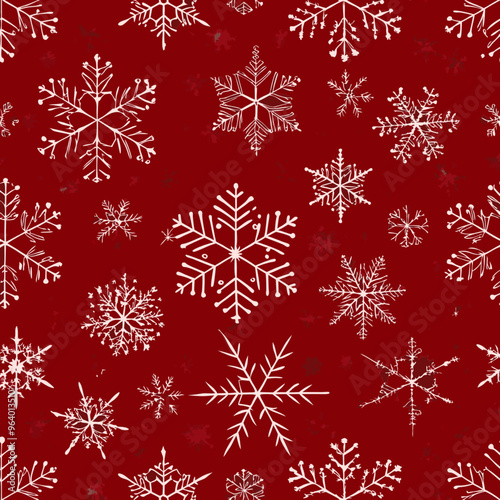 Seamless winter pattern with white snowflakes on a festive red background

