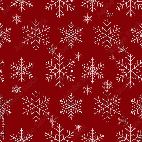 Seamless winter pattern with white snowflakes on a festive red background

