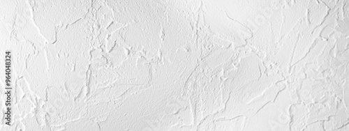 Background texture of a white plaster wall with a bumpy surface, 凸凹な質感のある漆喰の背景素材 photo