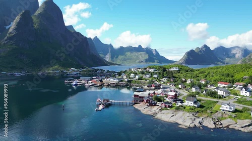 Aerial revolving shot of Reine in Lofoten Islands, Norway at summer