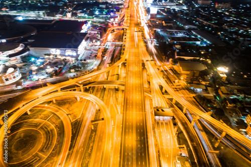 Aerial view night traffic transport road with vehicle movement photo