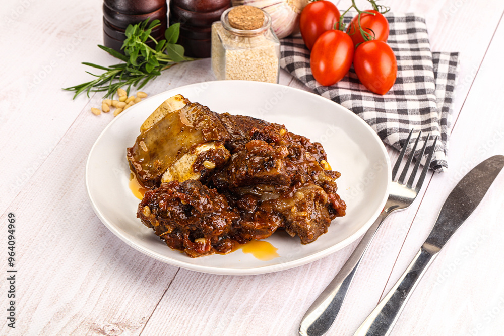 Prepared tasty beef ribs with sauce Prepared tasty beef ribs with sauce