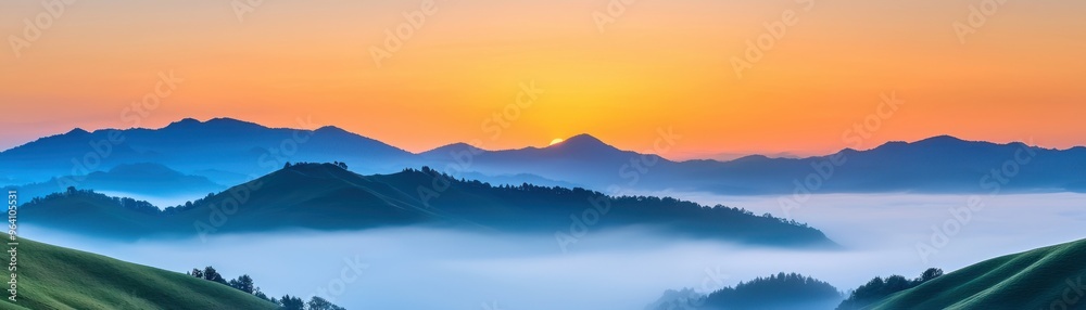 Stunning landscape featuring mountains and a vibrant sunrise over a sea of fog, showcasing nature's beauty and tranquility. Stunning landscape featuring mountains and a vibrant sunrise over a sea of fog, showcasing nature's beauty and tranquility.