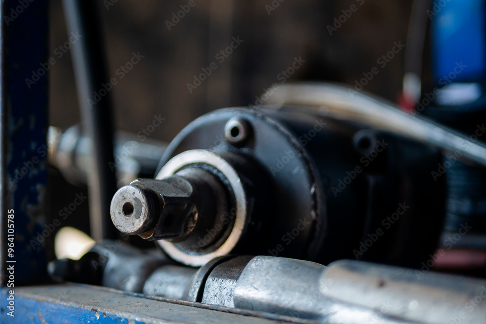 Mechanic tools engineering equipment car auto repair shop with copy space. Blurred background mechanical service. Heavy screw grungy rusted wrenches dirty screwdriver object. Industrial hardware set Mechanic tools engineering equipment car auto repair shop with copy space. Blurred background mechanical service. Heavy screw grungy rusted wrenches dirty screwdriver object. Industrial hardware set