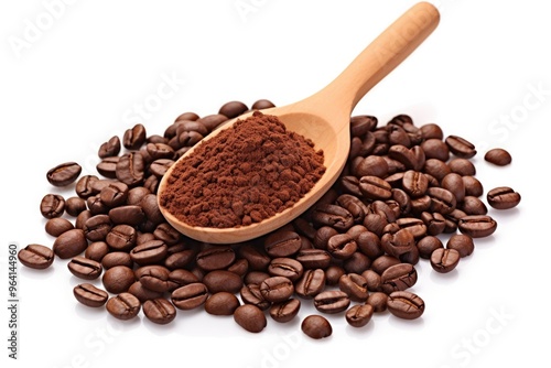 Ground coffee in wood spoon and pile whole roasted coffee beans, isolated on white background