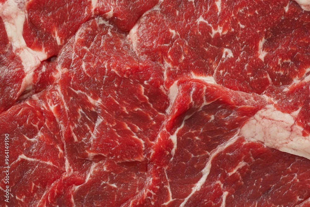 Detailed and closeup fresh raw red marbled beef texture showcases rich colors and unique textures Detailed and closeup fresh raw red marbled beef texture showcases rich colors and unique textures