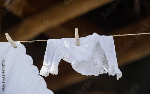 The clothes dry on a drying line with clips. A typical rural landscape.
