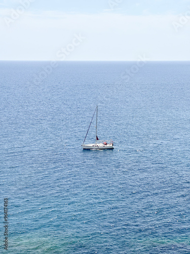 Sailboat in the Spanish ocean, view from Blanes