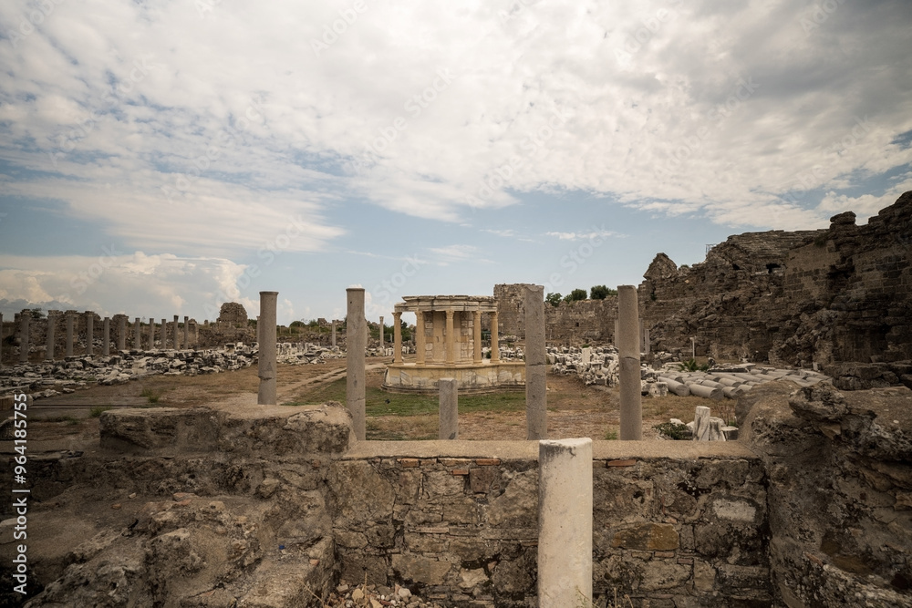 Ancient apollo roman Ruins Under Dramatic Cloudy Sky in Turkey in the town of side