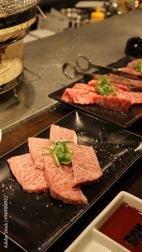Obraz na płótnie KoreanBeefGrill, Hanwoo, KoreanBBQ, GrilledBeef, KoreanCuisine, AsianCuisine, TraditionalKoreanFood, KoreanDining, CharcoalGrill, BeefLovers, KoreanBarbecue, KoreanMeatDish, AuthenticKorean, KoreanRes w salonie