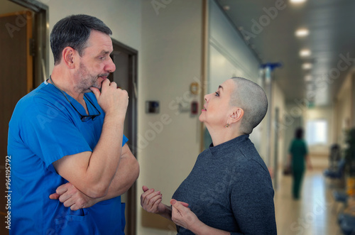фотографія Touching moment as surgeon reconnects with cancer survivor, exchanging health updates in busy medical facility corridor
