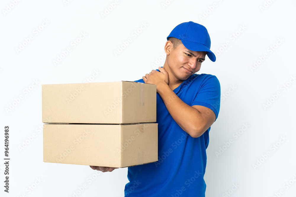 Delivery Ecuadorian man isolated on white background suffering from pain in shoulder for having made an effort Delivery Ecuadorian man isolated on white background suffering from pain in shoulder for having made an effort
