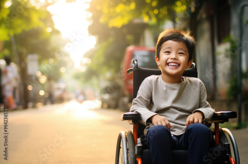 Young Boy Smiling in Wheelchair