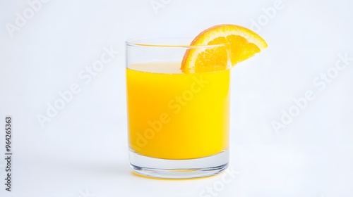 A glass of orange juice with a slice of orange on the rim.