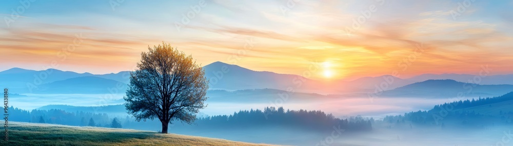Sunrise breaking through morning fog over rolling hills, foggy weather, peaceful dawn Sunrise breaking through morning fog over rolling hills, foggy weather, peaceful dawn