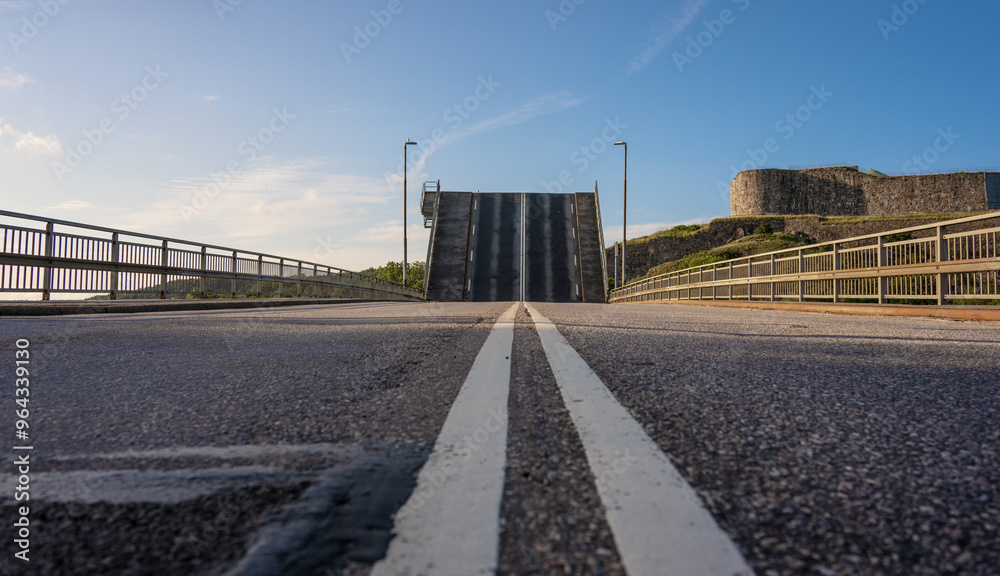 Bascule bridge opening on a summer evening. Bascule bridge opening on a summer evening.