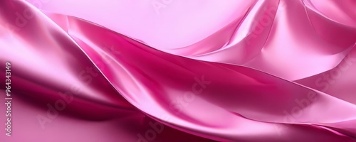 close-up view of a flowing, shiny pink fabric, with the fabric's folds and creases creating a sense of movement and depth.