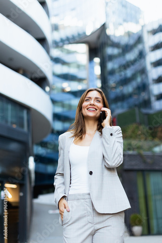 Woman in a light gray suit ...