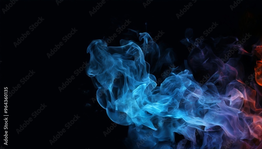 Fototapeta premium Vibrant blue and red smoke swirls against a dark background, creating an abstract and dynamic visual effect.