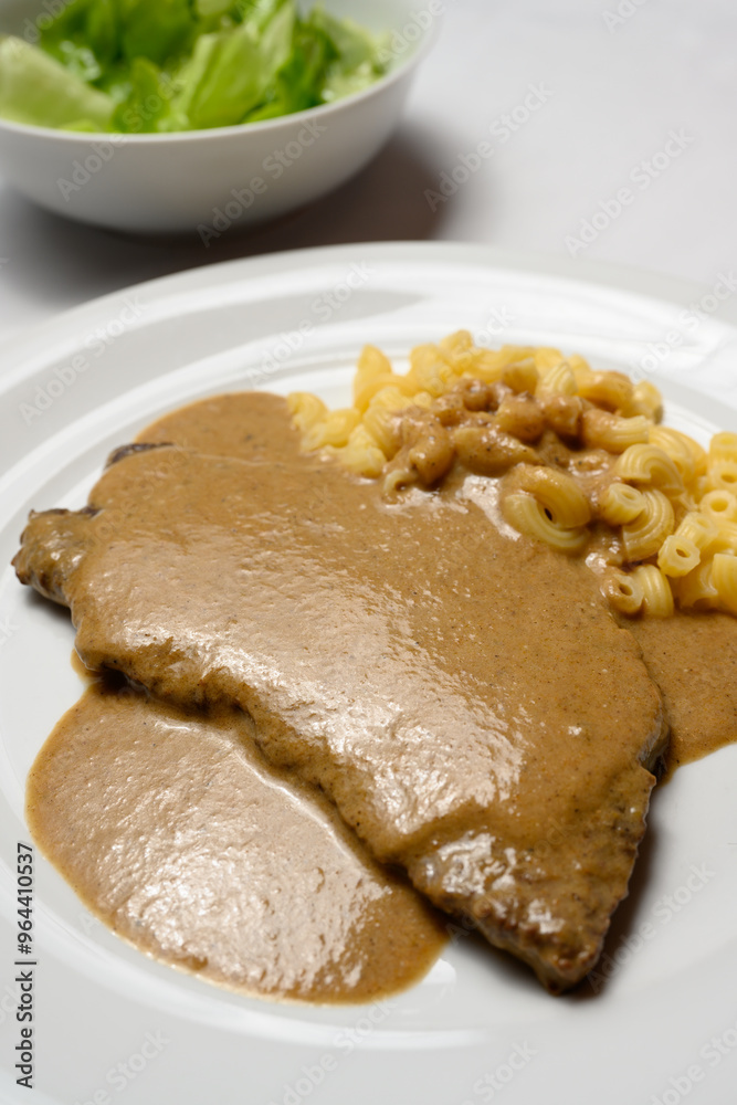 Beef Escalope or Rindsschnitzel with Sour Cream Sauce, Pasta Austrian Style Beef Escalope or Rindsschnitzel with Sour Cream Sauce, Pasta Austrian Style