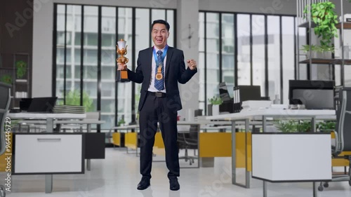 Wallpaper Mural Full Body Of Asian Business Man In A Suit And Tie With A Gold Medal And Trophy Screaming Goal Celebrating Winning As The First Winner In Office Torontodigital.ca