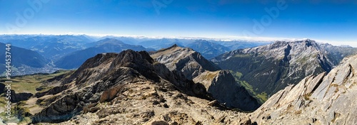 View from the Haldensteiner Calanda mountain peak. Great mountain panorama above Chur and Vättis. Trail running in the Graubünden mountains. Hiking in the Swiss Alps. High quality photo photo