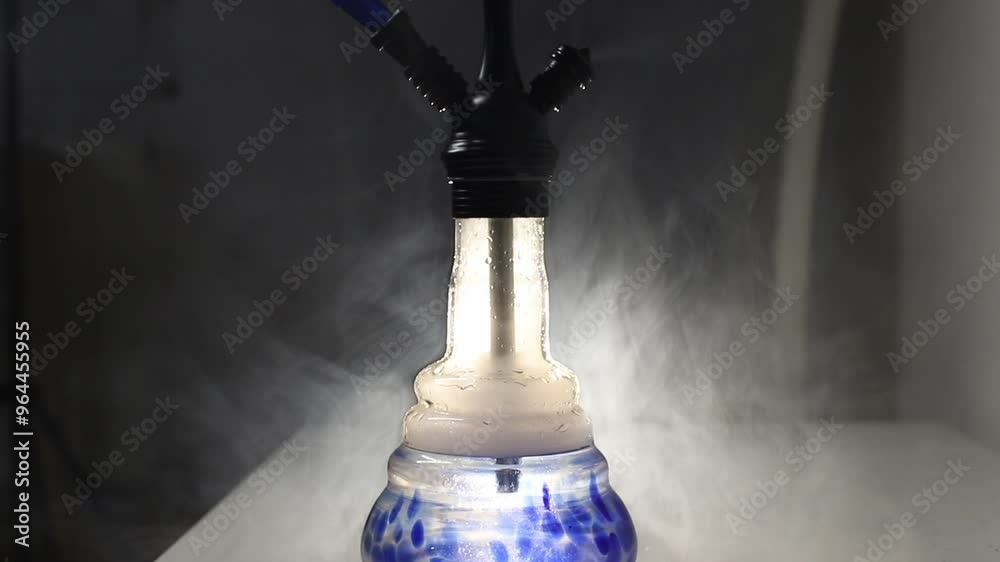 Close-up image of hookah. Slow motion view of the smoke.  Tabaco smoking