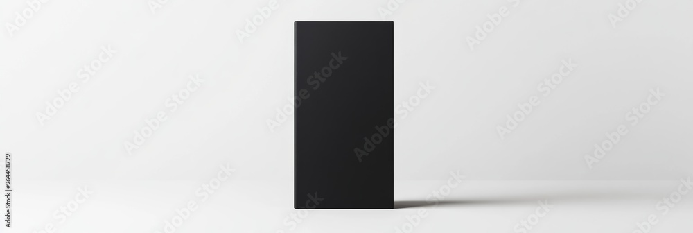 A black rectangular packaging box mockup, standing vertically with clean lines on a simple white background A black rectangular packaging box mockup, standing vertically with clean lines on a simple white background