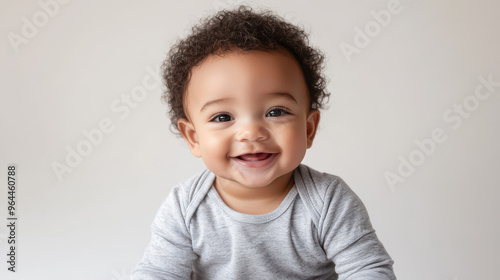 Portrait of Happy mixed-ethnicity baby boy, sitting happily ,isolated on a pure white background