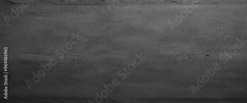Dark grey black textured concrete wall background. Dark black anthracite dark gray wall grunge textured concrete background. grunge charcoal old aged retro vintage stone concrete cement blackboard. 