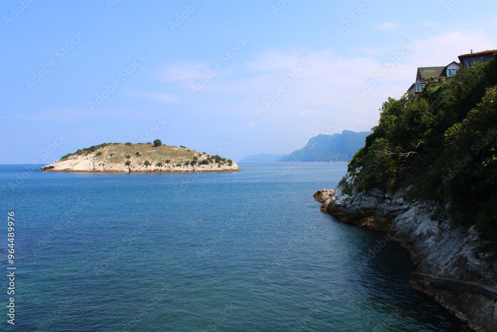 An island in the middle of the sea and the rocks next to it. Amasra, Bartin, Turkey An island in the middle of the sea and the rocks next to it. Amasra, Bartin, Turkey