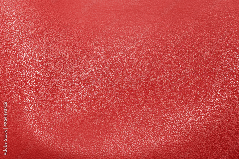 Fototapeta premium Red leather, closeup view of material texture