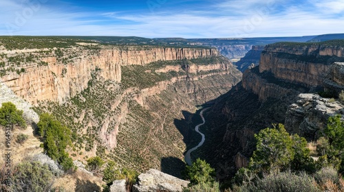 Majestic Canyon Vista: Scenic Panorama of River Gorge with Towering Cliffs