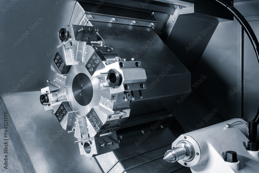 Naklejka premium Industrial modern cnc machine close up, drum type chuck for multiple tools
