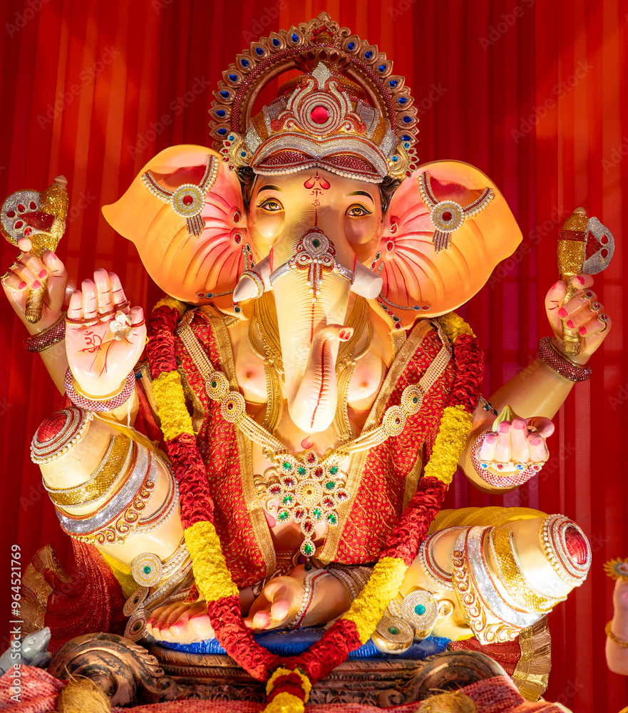 A Closeup shot Ganpati Installed in a Pandal during the 10 Day Ganesh Festival, the idols are immersed in heavy water bodies after the 10 days. A Closeup shot Ganpati Installed in a Pandal during the 10 Day Ganesh Festival, the idols are immersed in heavy water bodies after the 10 days.