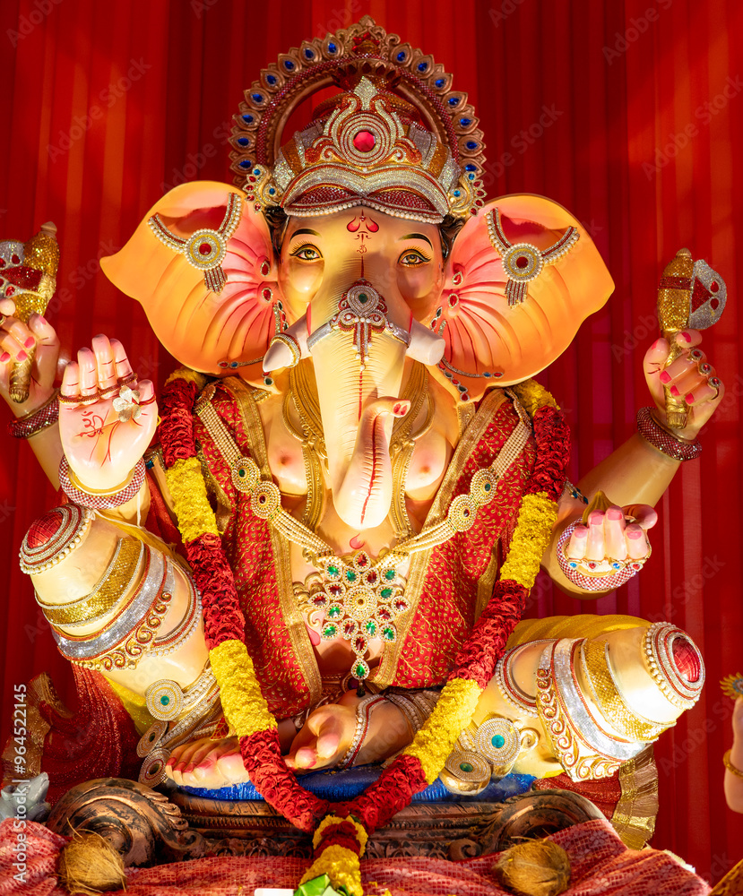 A Closeup shot Ganpati Installed in a Pandal during the 10 Day Ganesh Festival, the idols are immersed in heavy water bodies after the 10 days. A Closeup shot Ganpati Installed in a Pandal during the 10 Day Ganesh Festival, the idols are immersed in heavy water bodies after the 10 days.