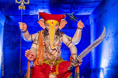 A Closeup shot Ganpati Installed in a Pandal during the 10 Day Ganesh Festival, the idols are immersed in heavy water bodies after the 10 days. photo