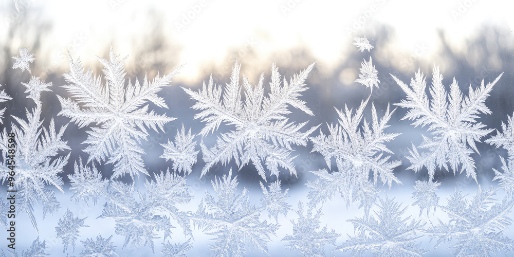 The texture of ice patterns on the window glass in winter frost. Christmas background with frosty pattern. The texture of ice patterns on the window glass in winter frost. Christmas background with frosty pattern.