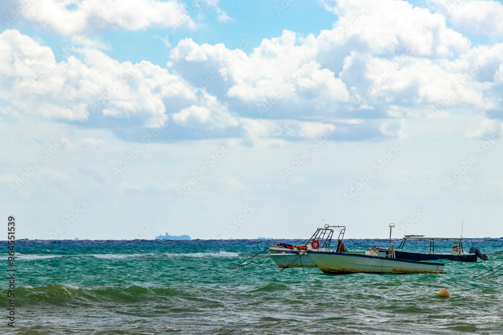 Boats yachts ship catamaran jetty beach Playa del Carmen Mexico.