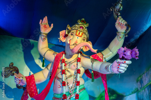 A Closeup shot Ganpati Installed in a Pandal during the 10 Day Ganesh Festival, the idols are immersed in heavy water bodies after the 10 days. photo